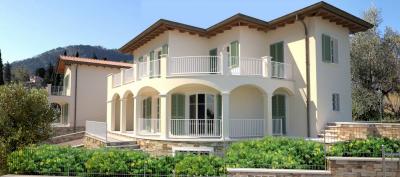 Villini bifamiliari di nuova progettazione con parco piscina e vista mare in vendita a Massarosa