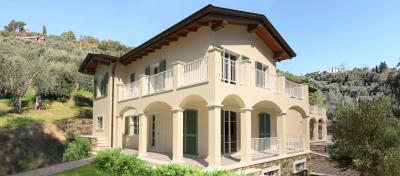 Villini bifamiliari di nuova progettazione con parco piscina e vista mare in vendita a Massarosa