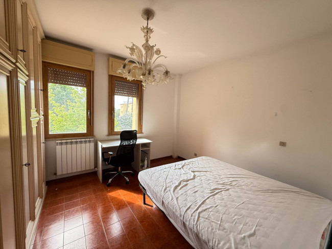 Ingrandisci la foto
