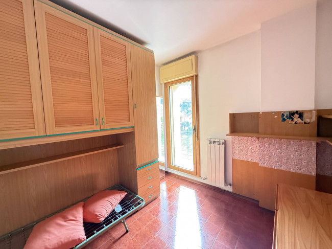 Ingrandisci la foto