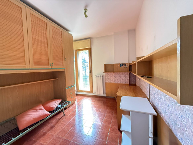 Ingrandisci la foto