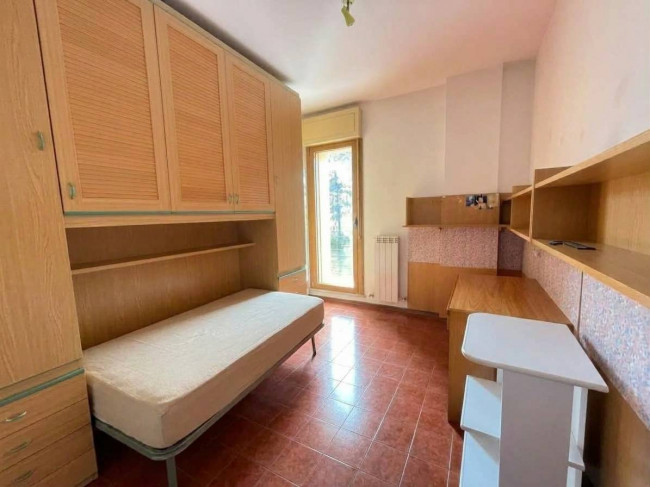 Ingrandisci la foto